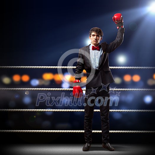 Portrait of a young businessman boxing. conceptual collage Portrait of a young businessman boxing. conceptual collage