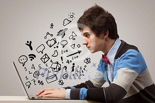 Young man sitting at table with laptop. Collage drawing Young man sitting at table with laptop. Collage drawing