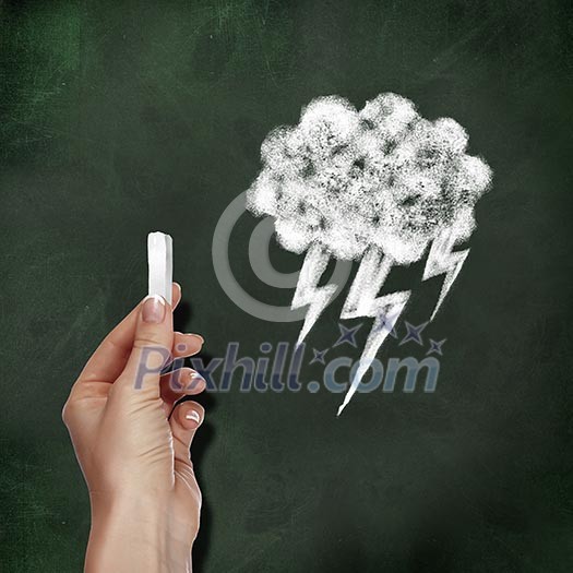 School blackboard and hand with chalk drawing thunder storm symbol
