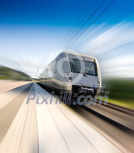 A speeding train leaving a train platform A speeding train leaving a train platform