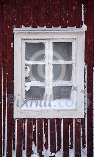 Old window covered in snow
