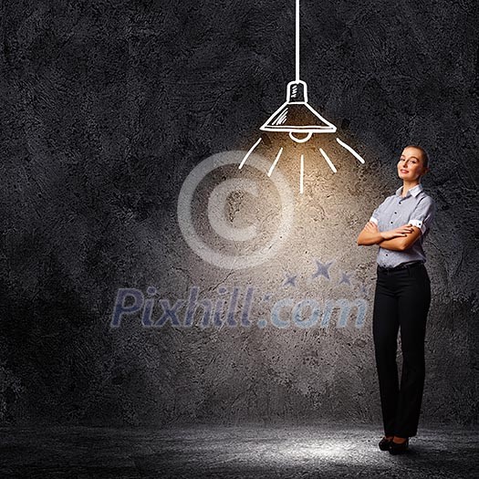 Image of attractive businesswoman against dark background