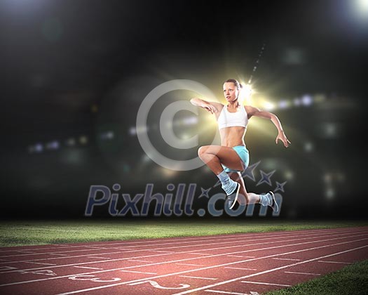 Image of young attractive sport woman exercising