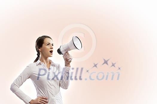 Image of young businesswoman screaming in megaphone