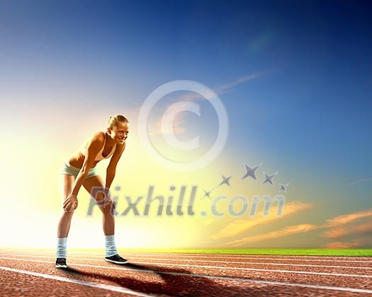 Image of young attractive sport woman exercising