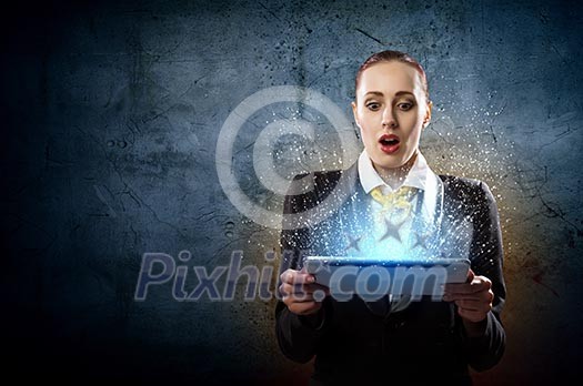 Image of astonished business woman holding ipad