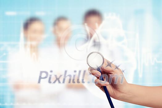 Close-up image of doctor's hand holding stethoscope Close-up image of doctor's hand holding stethoscope