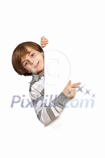 Little boy holding a blank white billboard