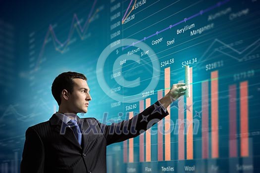 Image of young businessman touching icon of media screen Image of young businessman touching icon of media screen
