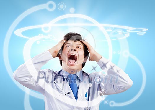 Young mad doctor in white uniform screaming Young mad doctor in white uniform screaming