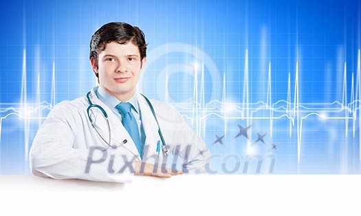 Young male doctor with blank banner. Place for text Young male doctor with blank banner. Place for text