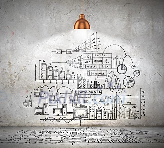 Drawn business plan on wall illuminated by lamp above Drawn business plan on wall illuminated by lamp above