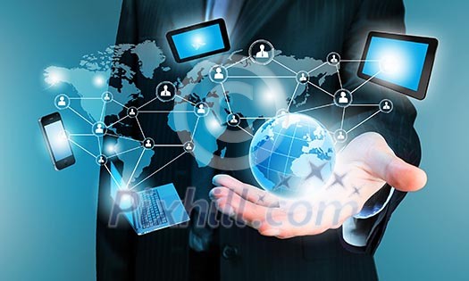 Image of business person holding devices in hands Image of business person holding devices in hands