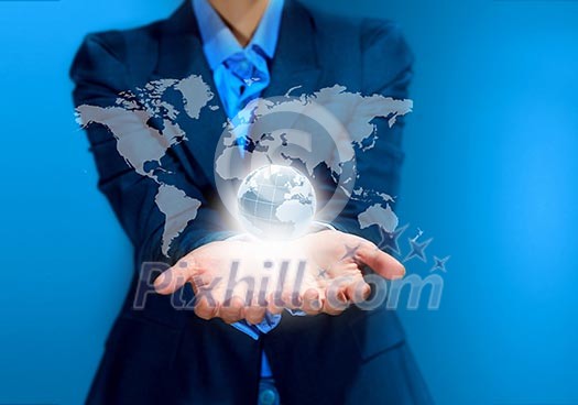 Image of business person holding devices in hands