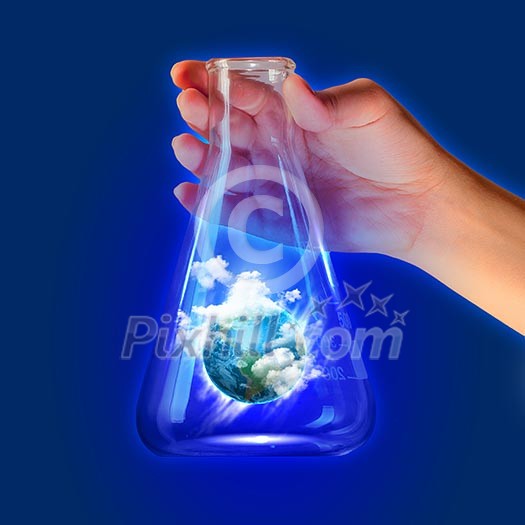 Image of earth planet in test tube. Ecology concept. Elements of this image are furnished by NASA Image of earth planet in test tube. Ecology concept. Elements of this image are furnished by NASA