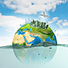 Image of earth planet floating in water. Global warming. Elements of this image are furnished by NASA
