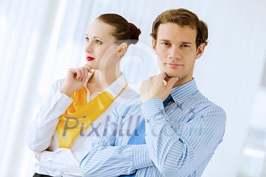 Image of businessman and businesswoman smiling joyfully Image of businessman and businesswoman smiling joyfully