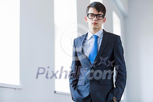 Image of handsome confident businessman in glasses Image of handsome confident businessman in glasses