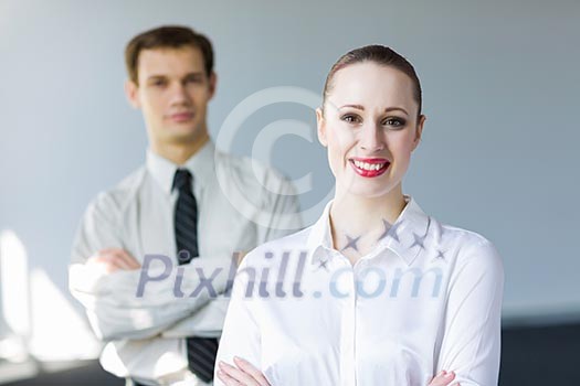 Young happy businesswoman with colleague. Leadership concept Young happy businesswoman with colleague. Leadership concept