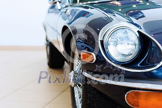 Close up image of car headlight. Front view Close up image of car headlight. Front view