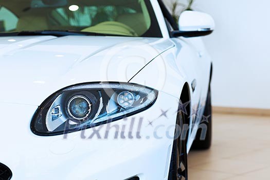 Close up image of car headlight. Front view Close up image of car headlight. Front view