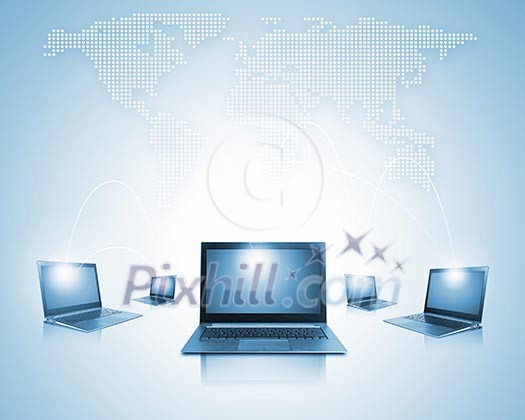 Laptops against world map background. Connection and cooperation Laptops against world map background. Connection and cooperation