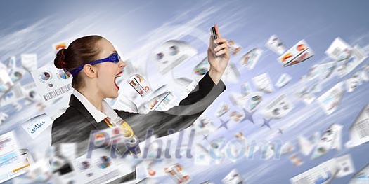 Angry businesswoman screaming aggressively in mobile phone