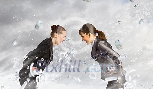 Image of two businesswomen in anger shouting at each other Image of two businesswomen in anger shouting at each other