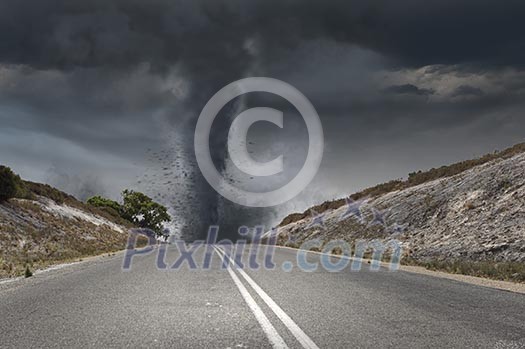 Image of powerful huge tornado twisting on road