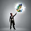 Image of magician in hat holding globe. Ecology concept. Elements of this image are furnished by NASA