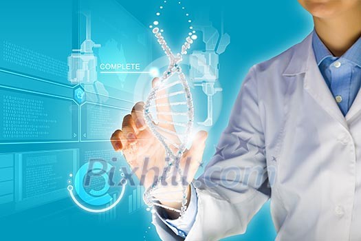 Woman scientist touching DNA molecule image at media screen Woman scientist touching DNA molecule image at media screen
