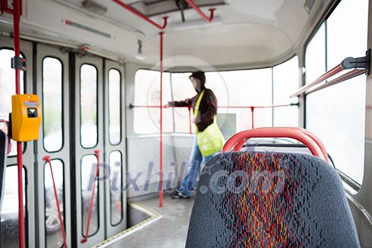 Public transport series - taking a tram commute to work/school (color toned image; shallow DOF)