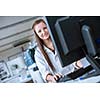 Portrait of a female chemistry student carrying out research in a chemistry lab (color toned image; shallow DOF)