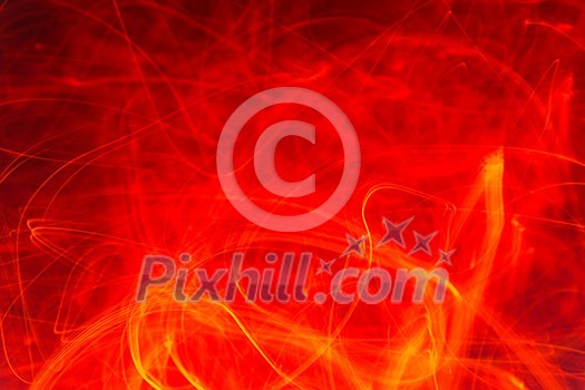 Blazing fire flames texture/background (long exposure used -> sparks are motion blurred) Blazing fire flames texture/background (long exposure used -> sparks are motion blurred)