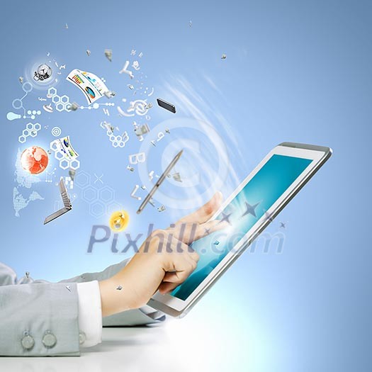 Close up image of human hand touching screen of tablet pc Close up image of human hand touching screen of tablet pc