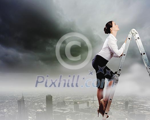 Image of young ambitious businesswoman climbing ladder. Promotion concept Image of young ambitious businesswoman climbing ladder. Promotion concept