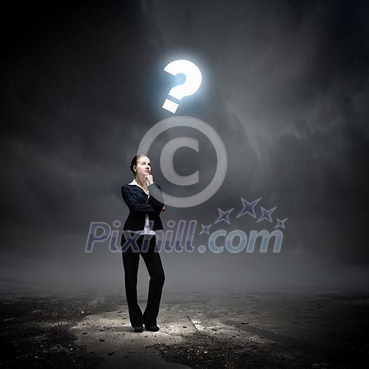 Image of concentrated businesswoman looking for answer