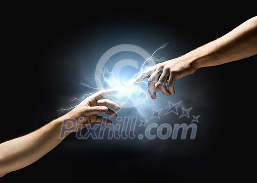 Michelangelo God's touch. Close up of human hands touching with fingers Michelangelo God's touch. Close up of human hands touching with fingers