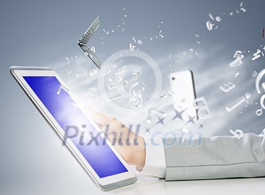 Close up image of human hand holding tablet pc Close up image of human hand holding tablet pc