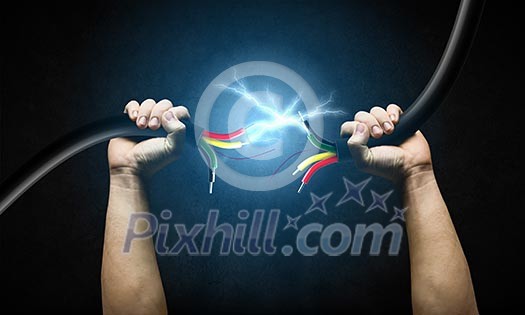 Cable in human hand. Power and connection Cable in human hand. Power and connection