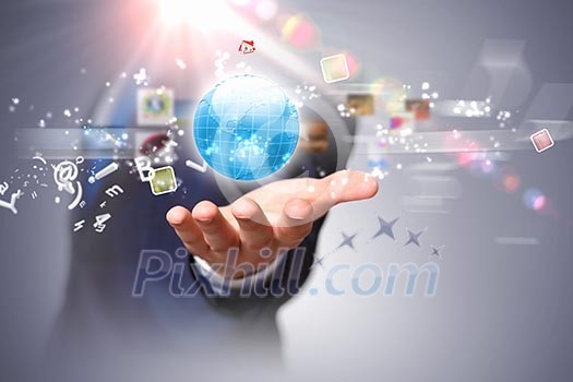 Image of globe on palm of businessman. Media technologies
