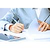 Close up image of businesswoman hands signing documents