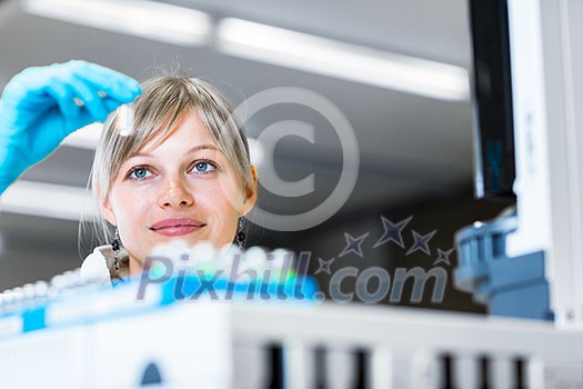 Portrait of a female researcher carrying out research in a chemistry lab (color toned image; shallow DOF) Portrait of a female researcher carrying out research in a chemistry lab (color toned image; shallow DOF)