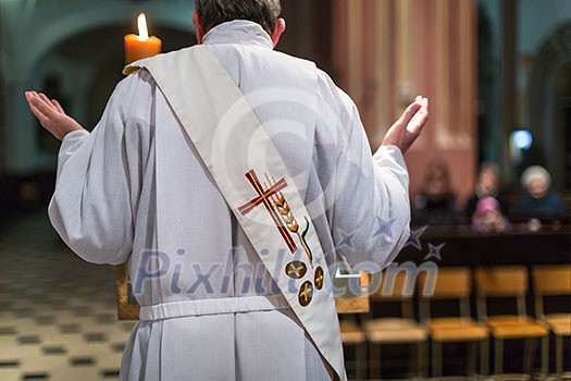 Priest during a ceremony/Mass Priest during a ceremony/Mass