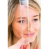 Optometry concept - pretty young woman having her eyes examined by an eye doctor (color toned image; shallow DOF)