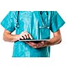 Young doctor using a tablet computer at work (color toned image)