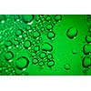 Refreshing green watery background (color toned image; shallow DOF)