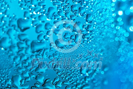 Refreshing blue watery background (color toned image; shallow DOF)