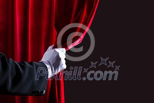 Close up of hand in white glove open the curtain. Place for text Close up of hand in white glove open the curtain. Place for text