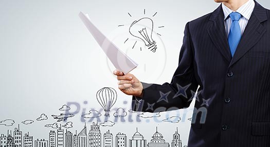 Close up of businessman with papers in hands Close up of businessman with papers in hands